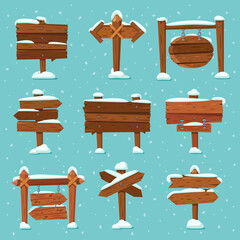 Cartoon snowed signpost. Christmas wooden signpost with snowcap. Arrows on snow and direction signs with icicles on top vector set © Tartila