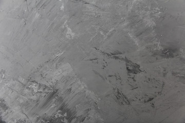concrete wall, gray plaster with traces of trowel. abstraction