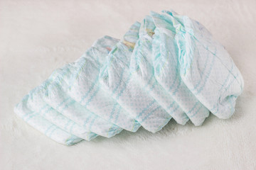 Baby diapers on a white background, diapers for babies