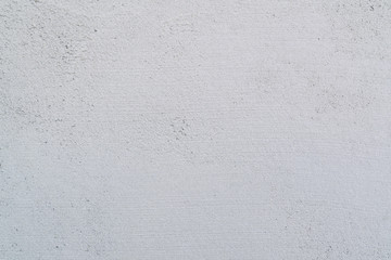 wet cement on building house for background and texture