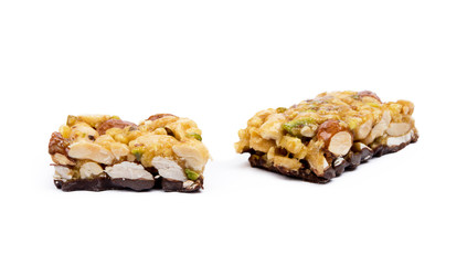 Nut bar with chocolate isolated on white background