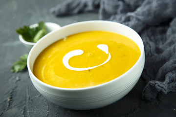 Homemade pumpkin soup with cream