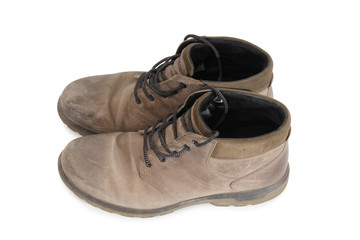 Old leather shoes on a white background