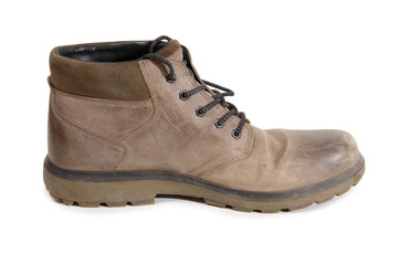 Old leather shoes on a white background