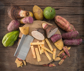 taro and yam on wooden table.