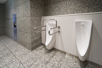 Modern high tech toilet with electronic bidet in Japan. Industry leaders recently agreed on signage...