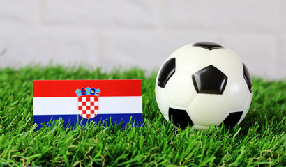 ball and Croatian flag on Green grass Concept champion football 2018