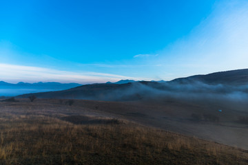 Morning fog on the hill