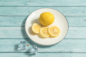 Lemon and cyan wood background