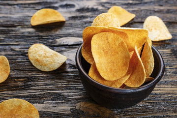potato chips on a wooden background