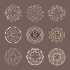 Brown vector set of 9 mandalas in tribal style.