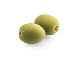 Two green olives isolated on white background.