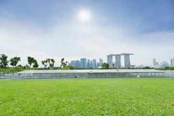 Solar panels energy field at singapore public park with blue sky, New alternative energy from natural, Singapore. - obrazy, fototapety, plakaty