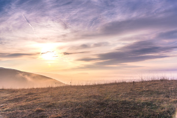 Dramatic clouds on the sky at the sunset