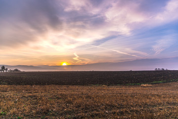 Dramatic clouds on the sky at the sunset