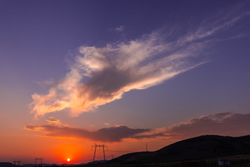 Dramatic clouds on the sky at the sunset