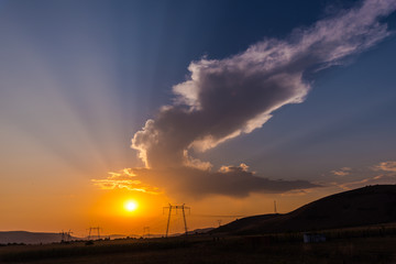 Dramatic clouds on the sky at the sunset