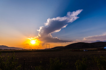 Dramatic clouds on the sky at the sunset