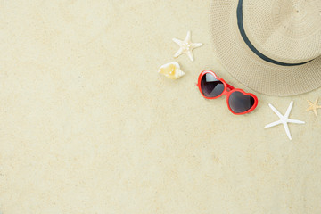 Table top view aerial image of fashion to travel in summer holiday background.Flat lay accessories clothing for traveler.Hat & sunglasses on rustic white paper wallpaper.Free space for add content.