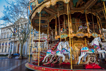 French old-fashioned style carousel with stairs at Place de l'Horloge in Avignon France © anamejia18