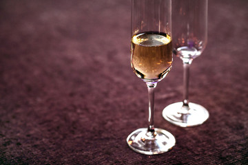 top of bar in interior and two glasses of champagne