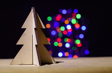 Christmas toy tree on bokeh blur light background