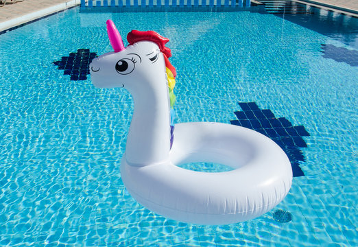 Unicorn inflatable float for kids and adult. Summer holidays, beach vacation. Fantasy swim ring. Copyplace, place for text
