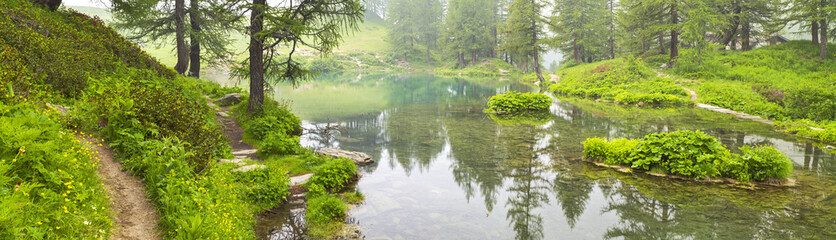 panorama fog morning on lake in Italy