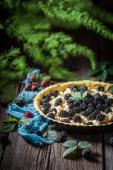 Sweet and rustic blackberry pie with caster cugar