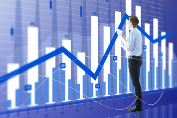 businessman in office with chart