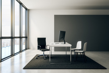 blank black poster on office wall