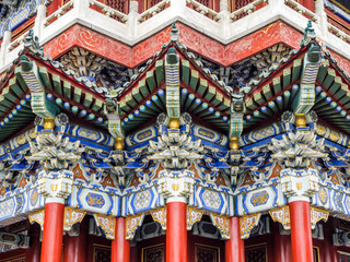 Buddhist Temple with colorful decorative details at the top of the Tianmen Mountain, Hunan Province, Zhangjiajie, China