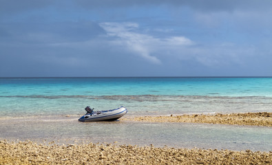 reef ring, lagoon and motu with palm trees on Makemo Atoll, Tuamotus archipelago, French Polynesia, France,