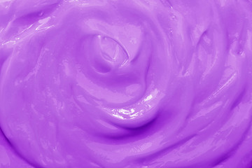 Ultra violet texture of cosmetic cream.