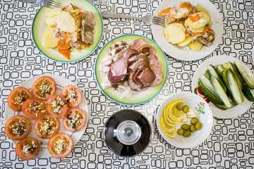 A table with dishes of Russian cuisine
