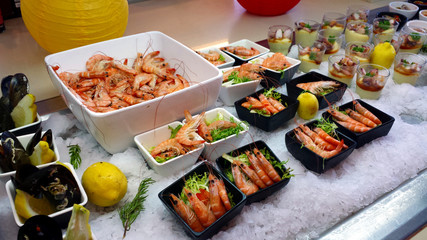 Seafood in different bowls, in the hotel restaurant.