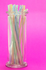 Straws in a glass jar
