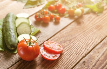 fresh organic tomato on wooden table. tomatoes background