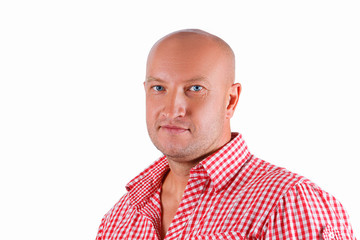 portrait of a handsome man in a red shirt on a white background