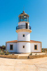 Fototapeta na wymiar Lighthouse on the island Gavdos, located on the southwest coast near the village Ampelos. It is also a history museum of pictures from lighthouses on the island