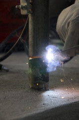 welds of a railing during the renovation of a roof in the evening in Italy