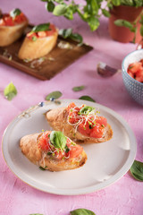 Traditional italian bruschetta on bright background