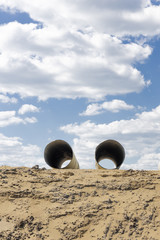 mountain of sand, trumpet and sky