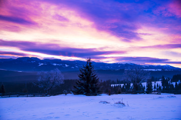 Fototapeta premium Winter clouds at the sunset