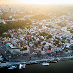 Panoramic view of a modern city at sunset. Skyline bird eye aerial view of the old part of the city...