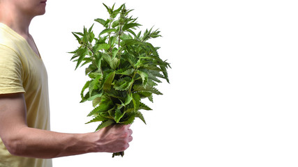 Conception - breakup of relationships, divorce. Man with bunch of nettle in hand, isolated on white...