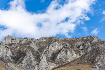 Mountains stone and white clouds