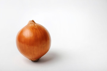 Fresh ripe onion bulb on light background