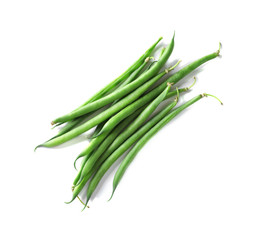 Fresh green French beans on white background