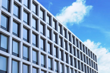 Building with tinted windows, outdoors. Modern architectural design